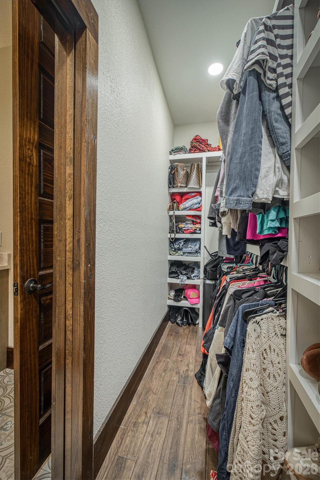2243 Cottage Park Road Morganton, NC 28655 - Photo 29 of 48 a view of walk in closet with clothes