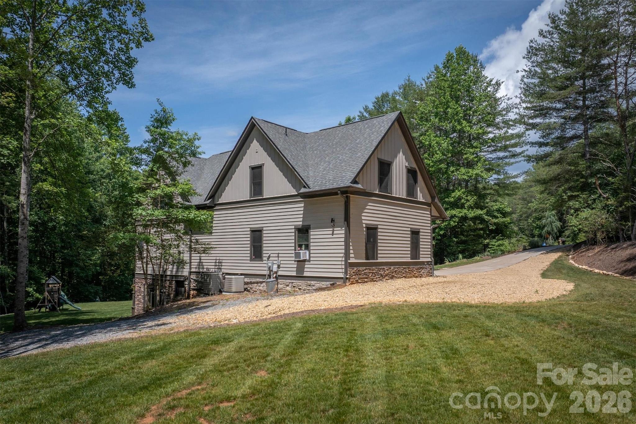 2243 Cottage Park Road Morganton, NC 28655 - Photo 4 of 48 a view of a house with a yard and sitting area