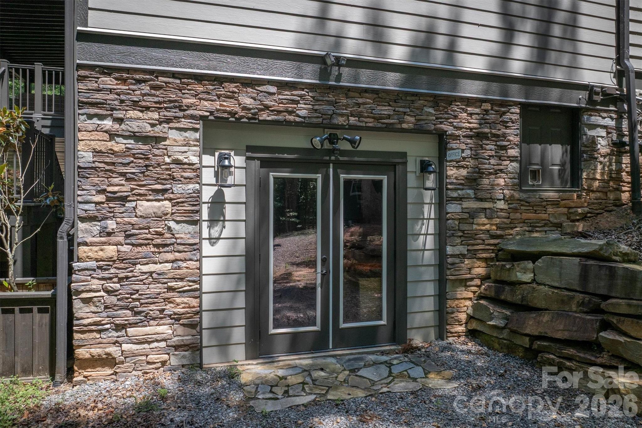 2243 Cottage Park Road Morganton, NC 28655 - Photo 7 of 48 a front view of a building with a garden