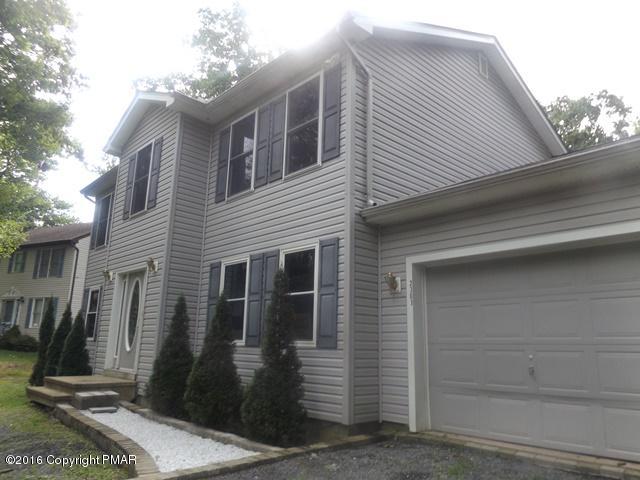6155 Horatio Road Tobyhanna, PA 18466 - Photo 1 of 10 a front view of a house