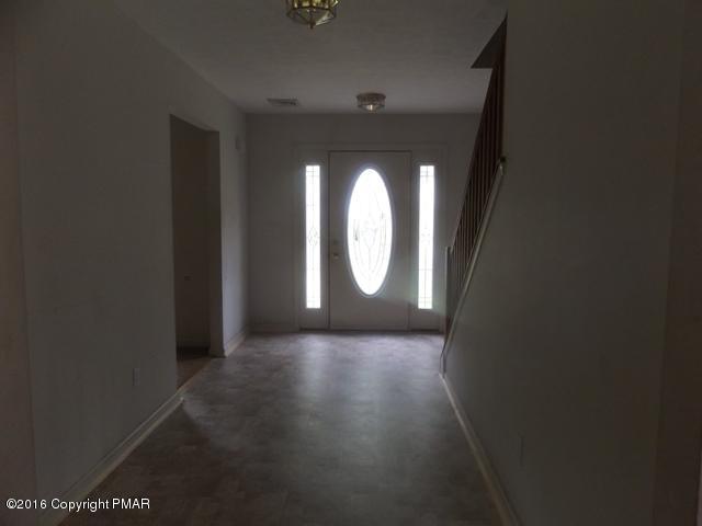 6155 Horatio Road Tobyhanna, PA 18466 - Photo 2 of 10 a view of a livingroom with wooden floor