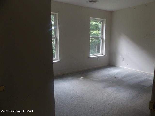 6155 Horatio Road Tobyhanna, PA 18466 - Photo 5 of 10 a view of an empty room with a window