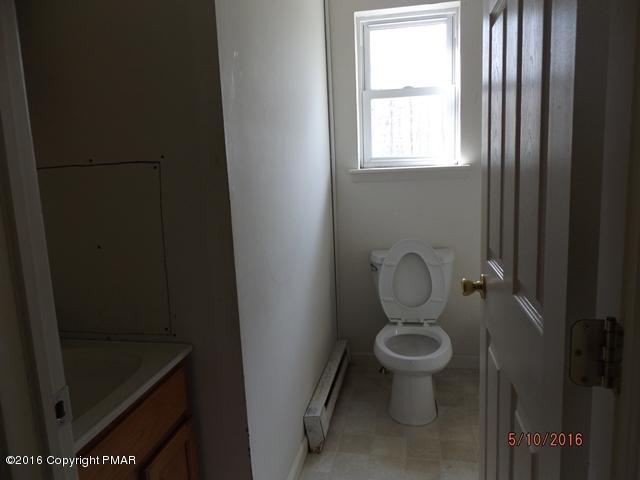 6155 Horatio Road Tobyhanna, PA 18466 - Photo 6 of 10 a bathroom with a toilet
