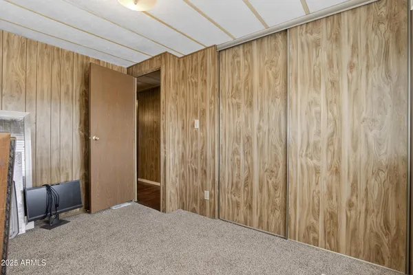 a view of a room with a wooden walls