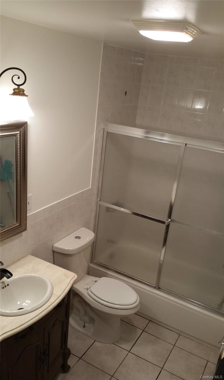 15 Mt Hope Road Carmel, NY 10541 - Photo 12 of 13 a bathroom with a toilet a sink and shower