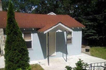 15 Mt Hope Road Carmel, NY 10541 - Photo 2 of 13 a front view of a house with garden