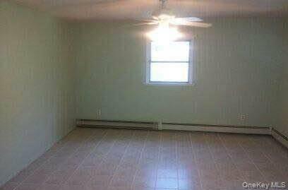 15 Mt Hope Road Carmel, NY 10541 - Photo 6 of 13 an empty room with a window