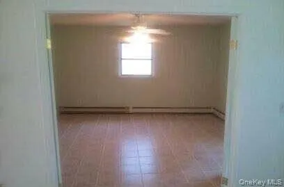 a view of a window in an empty room