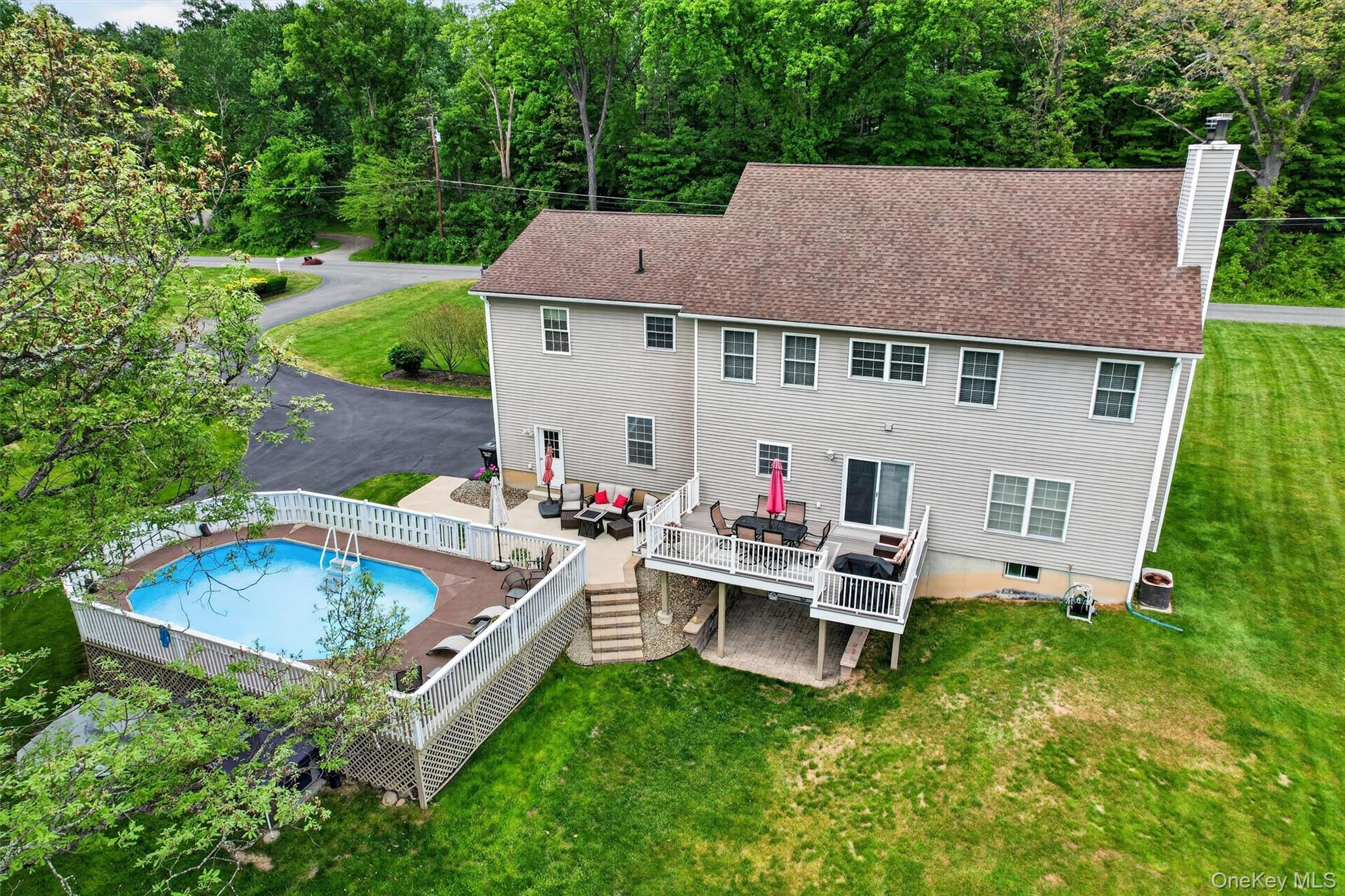 19 Pirog Road Pine Bush, NY 12566 - Photo 44 of 50 a view of house with backyard entertaining space and trampoline