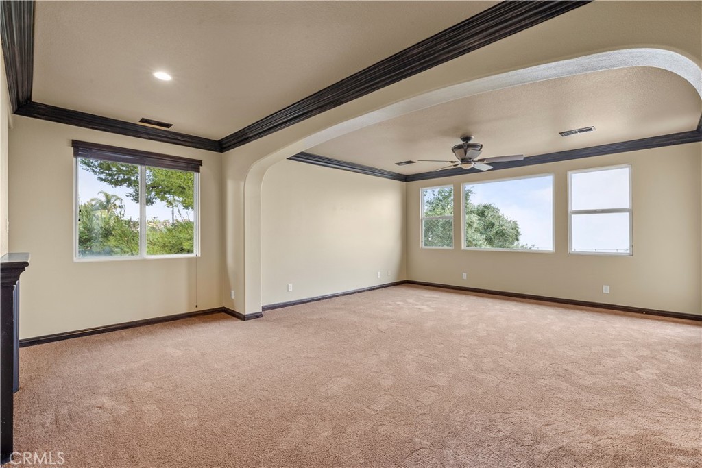 18301 Lakepointe Drive Riverside, CA 92503 - Photo 24 of 67 an empty room with windows