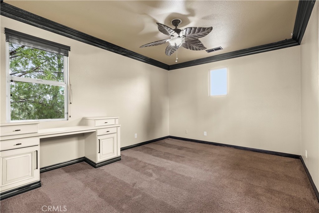 18301 Lakepointe Drive Riverside, CA 92503 - Photo 34 of 67 a view of an empty room with a window