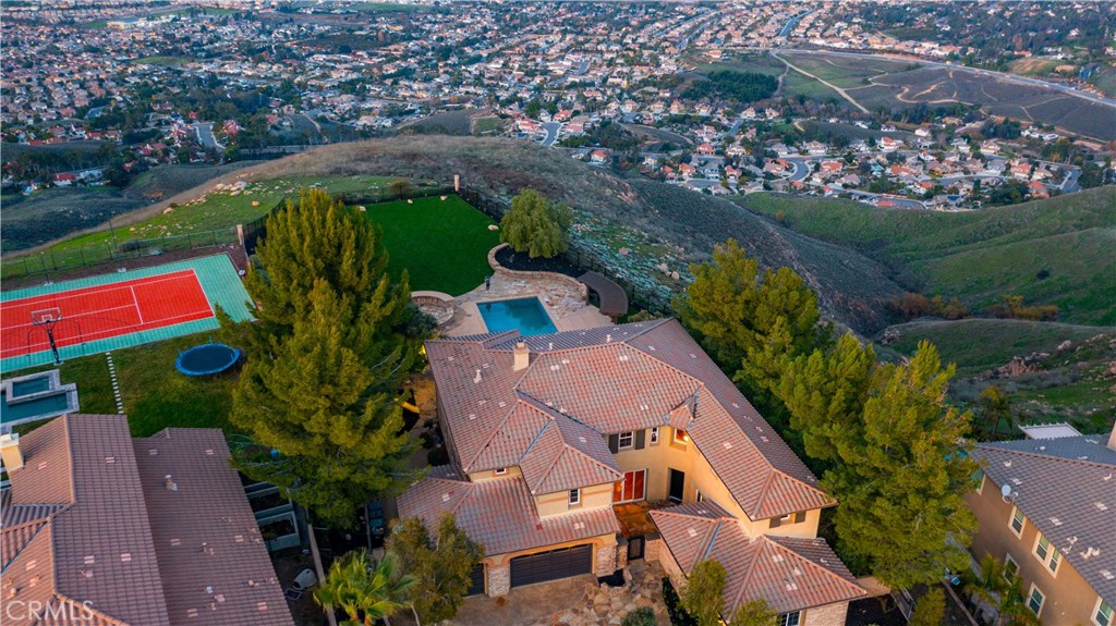 18301 Lakepointe Drive Riverside, CA 92503 - Photo 4 of 67 an aerial view of house with a yard and swimming pool
