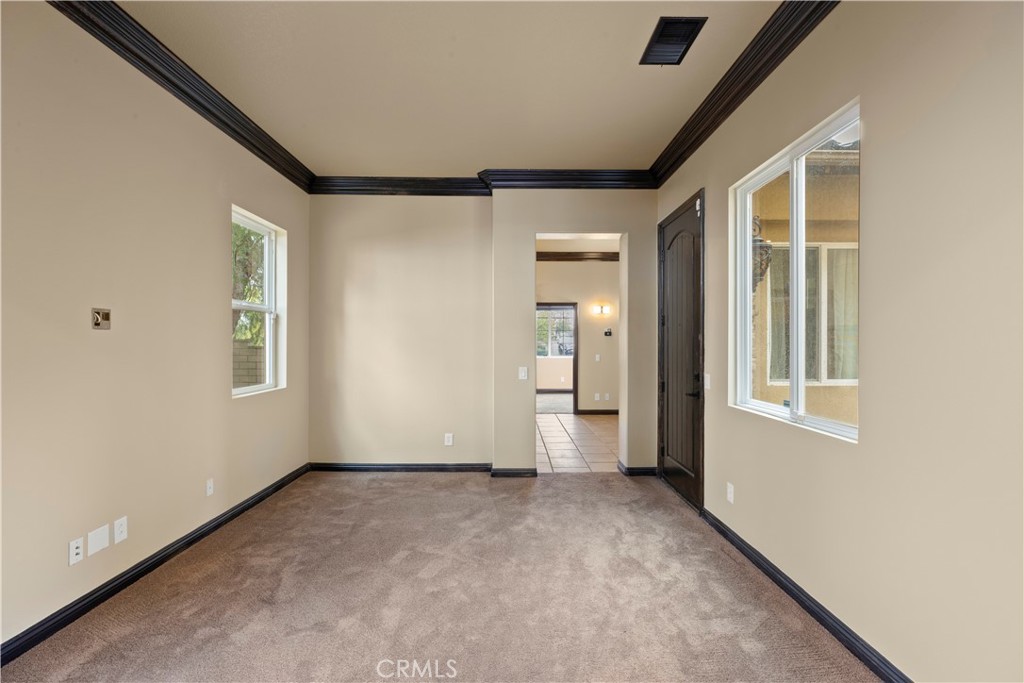 18301 Lakepointe Drive Riverside, CA 92503 - Photo 42 of 67 an empty room with windows