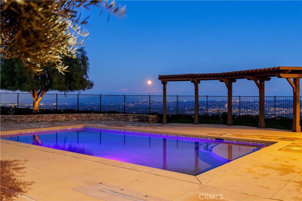 18301 Lakepointe Drive Riverside, CA 92503 - Photo 51 of 67 a view of a swimming pool with a patio