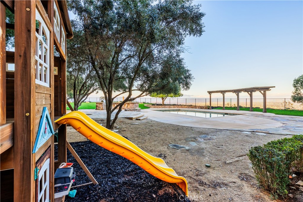 18301 Lakepointe Drive Riverside, CA 92503 - Photo 55 of 67 a view of swimming pool with a backyard