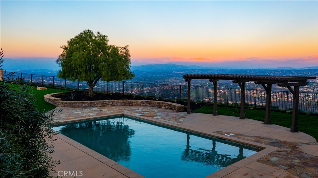18301 Lakepointe Drive Riverside, CA 92503 - Photo 65 of 67 a view of a swimming pool with a patio