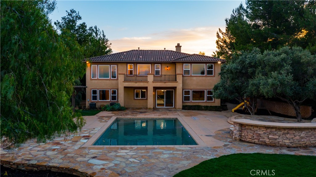 18301 Lakepointe Drive Riverside, CA 92503 - Photo 66 of 67 a front view of a house with a yard