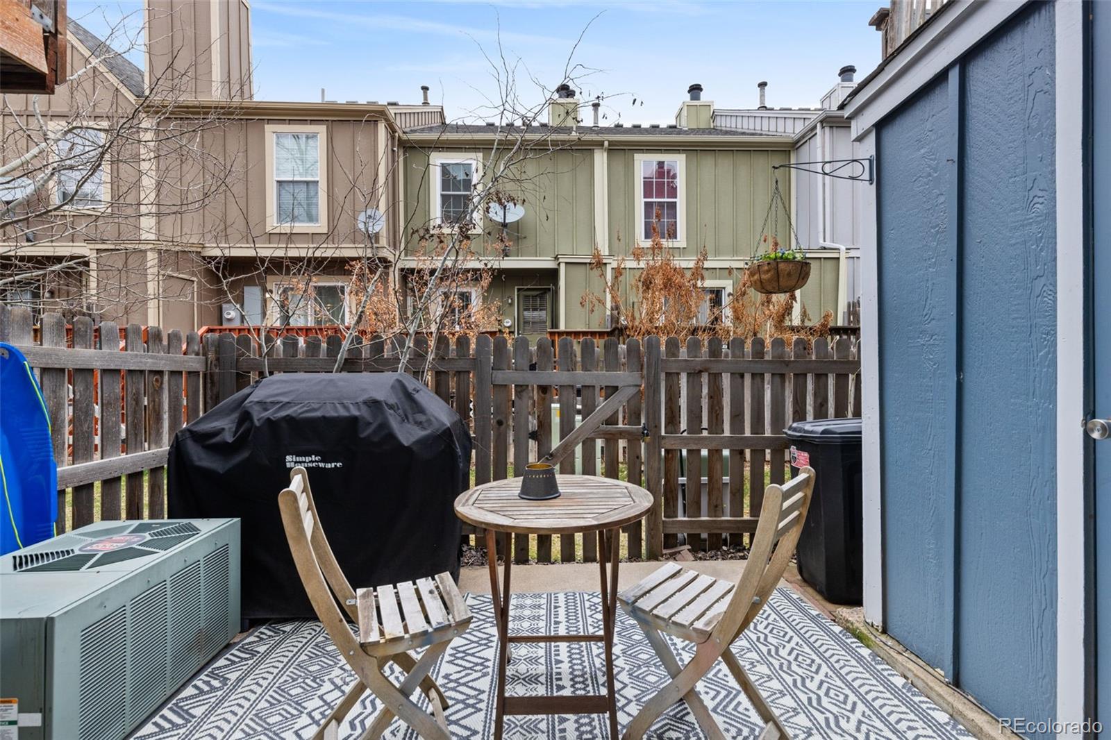 8228 South Fillmore Circle Centennial, CO 80122 - Photo 12 of 23 a view of a patio with table and chairs