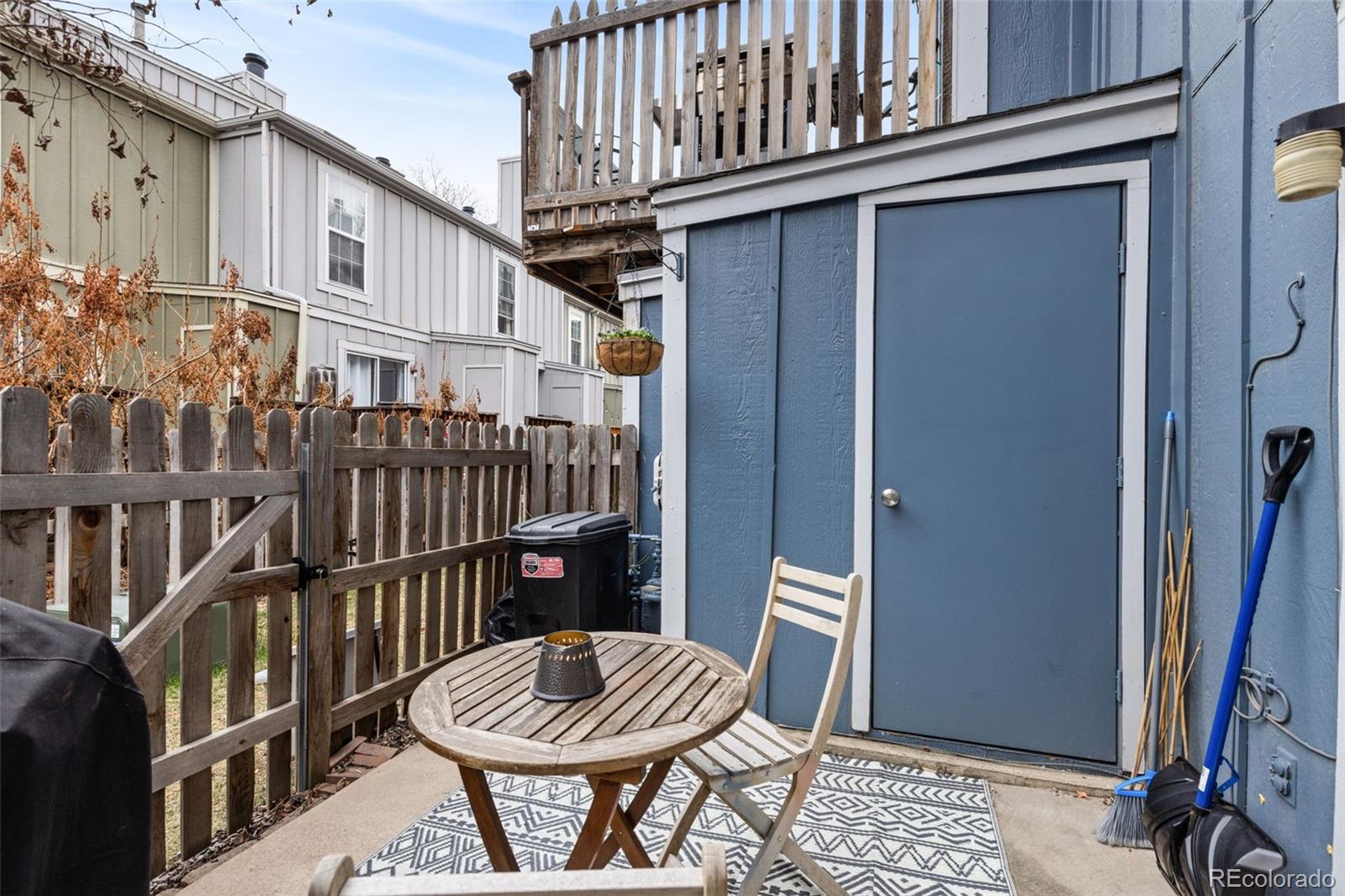 8228 South Fillmore Circle Centennial, CO 80122 - Photo 13 of 23 a view of a chair and table in the balcony