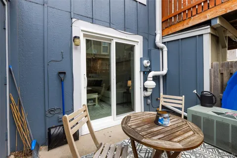 a table and chairs in a patio