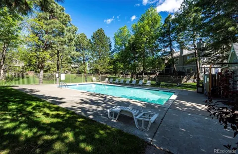 a view of a street with a yard