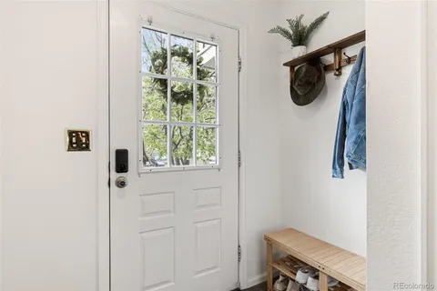 a view of a entryway with wooden floor