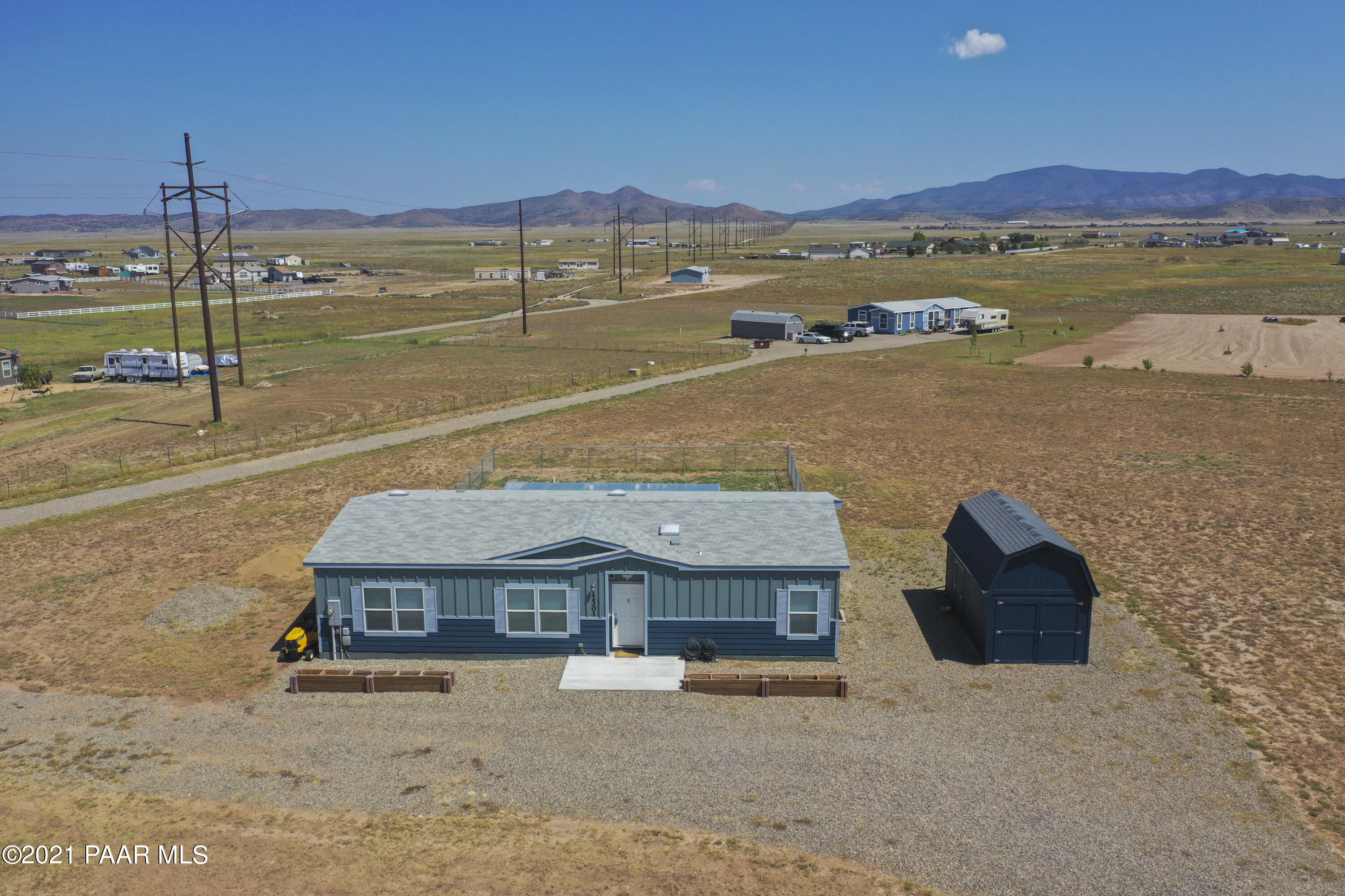 12301 North Poquito Valley Road Prescott Valley, AZ 86315 - Photo 30 of 31 an aerial view of a house with a ocean view