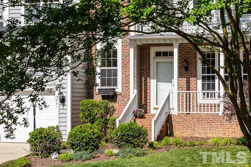 9501 Miranda Drive Raleigh, NC 27617 - Photo 2 of 30 Who doesn't love an expansive front porch on which to await your guests?