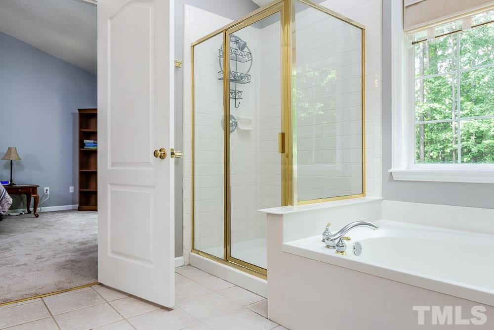 9501 Miranda Drive Raleigh, NC 27617 - Photo 18 of 30 Relax in the garden tub with a clear view of the stars!