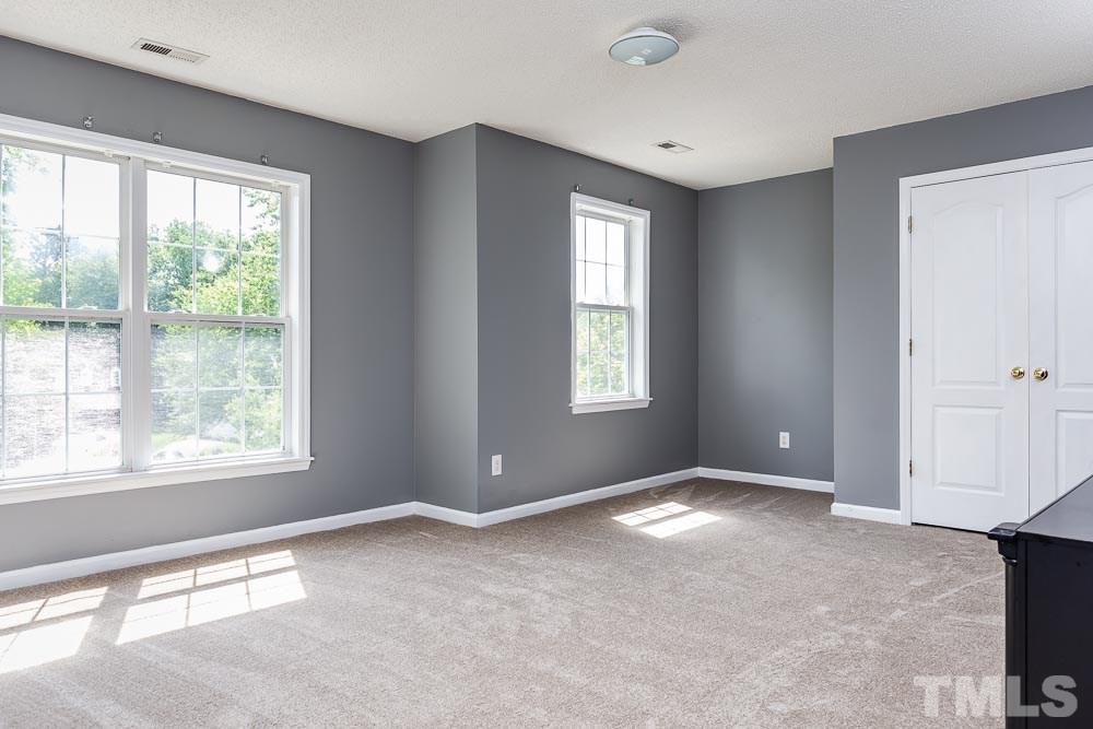 9501 Miranda Drive Raleigh, NC 27617 - Photo 19 of 30 HUGE, sunny space with a large closet offering multitudes of options!