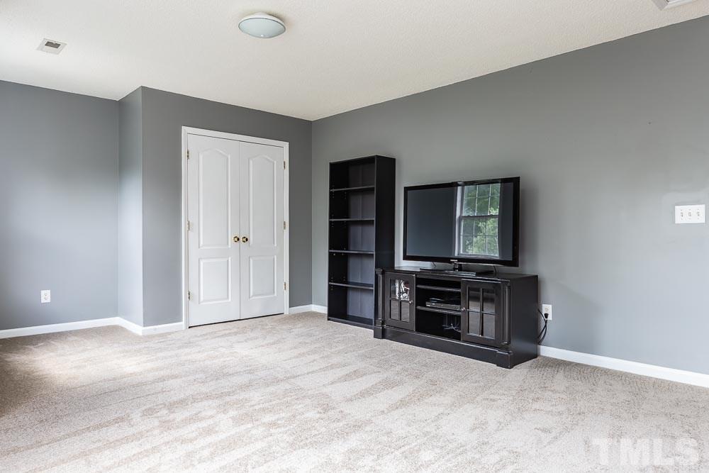 9501 Miranda Drive Raleigh, NC 27617 - Photo 20 of 30 Media room? Play room? Billiards? How will YOU love this room??