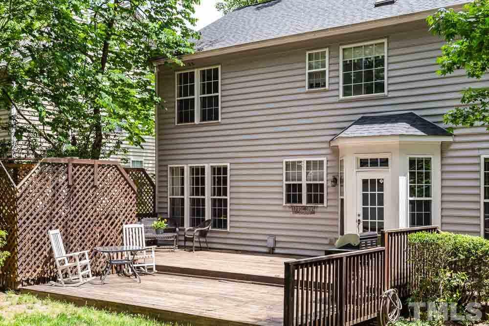 9501 Miranda Drive Raleigh, NC 27617 - Photo 26 of 30 Massive decks for everything you could ever want to do outside! Parties? Kiddie pool? Corn hole? Sunbathing? Working in the peace and quiet?