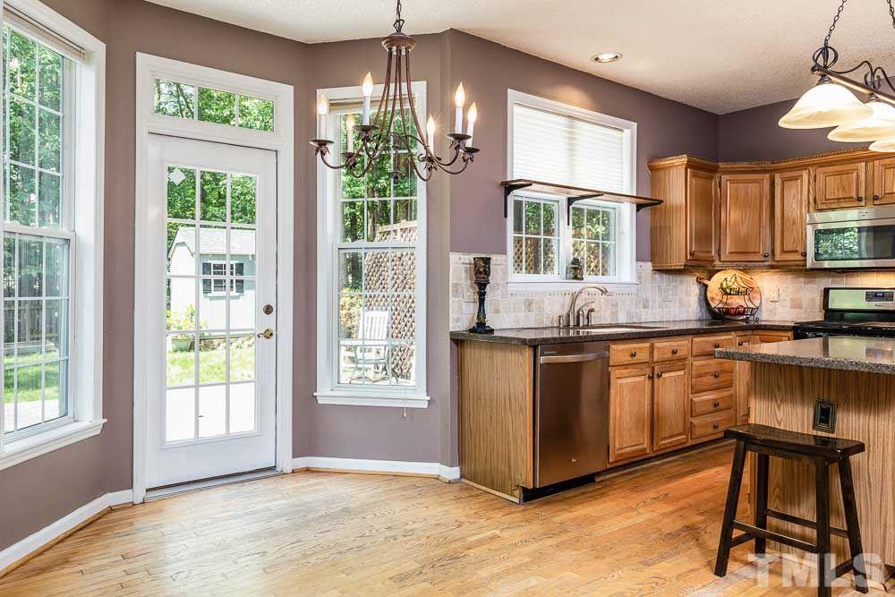 9501 Miranda Drive Raleigh, NC 27617 - Photo 6 of 30 More windows to bring in the sunshine for cheery breakfasts!