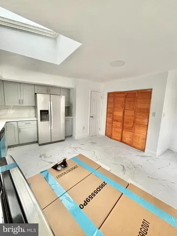 a room with a bed and a window