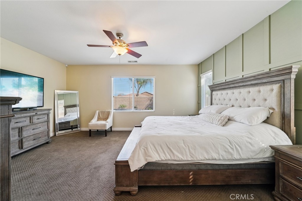 28552 Rustic Glen Street Menifee, CA 92584 - Photo 19 of 48 Spacious primary bedroom retreat with plenty of natural light