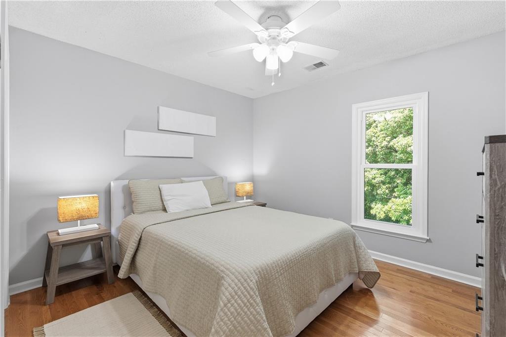 3800 Meeting Street Northwest Duluth, GA 30096 - Photo 24 of 46 a bedroom with a bed and a window