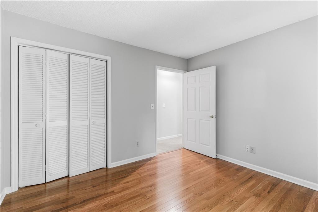 3800 Meeting Street Northwest Duluth, GA 30096 - Photo 27 of 46 a view of an empty room with wooden floor