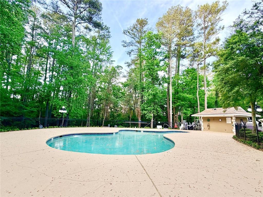 3800 Meeting Street Northwest Duluth, GA 30096 - Photo 46 of 46 a view of a swimming pool with a yard