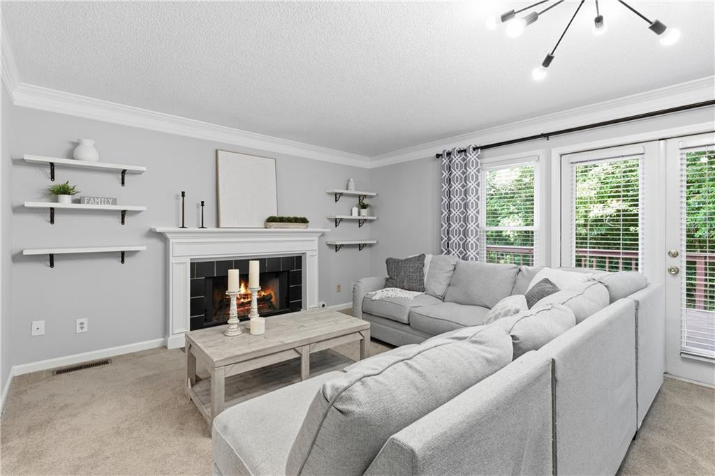 3800 Meeting Street Northwest Duluth, GA 30096 - Photo 5 of 46 a living room with furniture and a fireplace