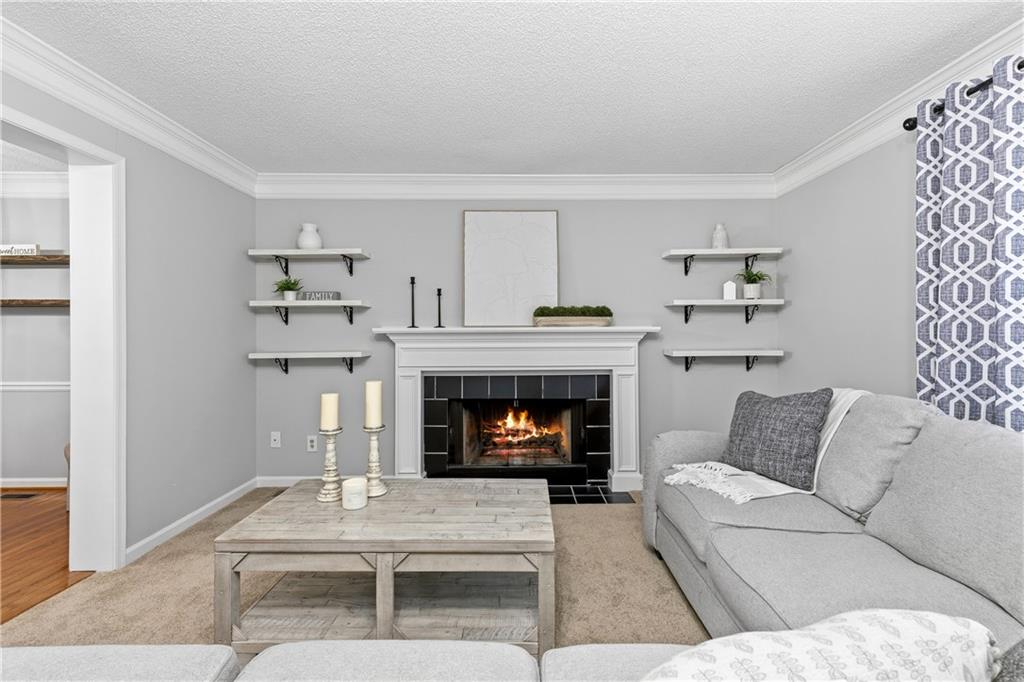 3800 Meeting Street Northwest Duluth, GA 30096 - Photo 7 of 46 a living room with furniture and a fireplace