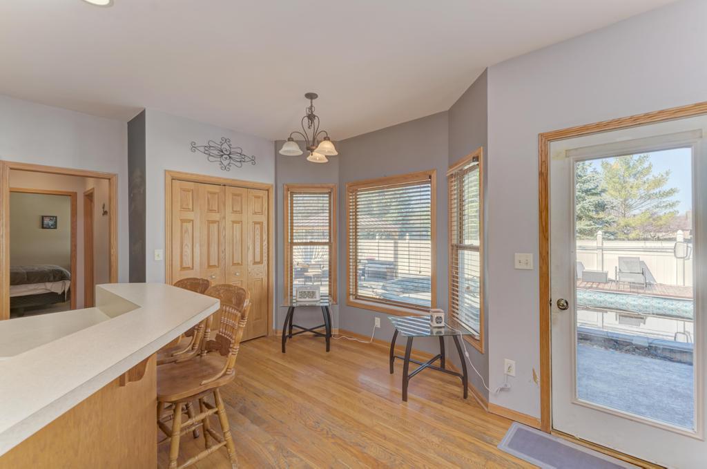1648 Periwinkle Drive Morris, IL 60450 - Photo 12 of 40 a view of a dining room with furniture window and wooden floor