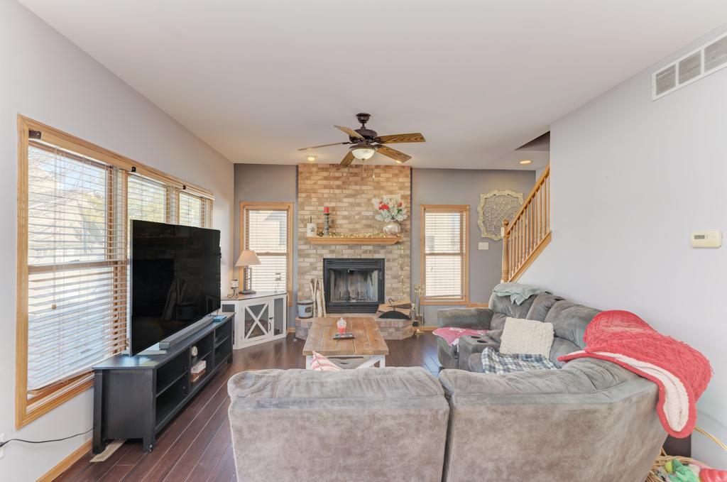1648 Periwinkle Drive Morris, IL 60450 - Photo 17 of 40 a living room with fireplace furniture and a flat screen tv
