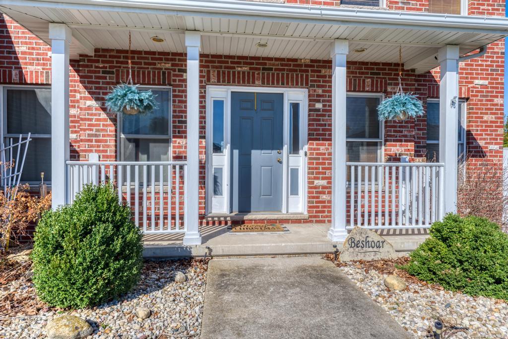 1648 Periwinkle Drive Morris, IL 60450 - Photo 2 of 40 a front view of a house with a garden