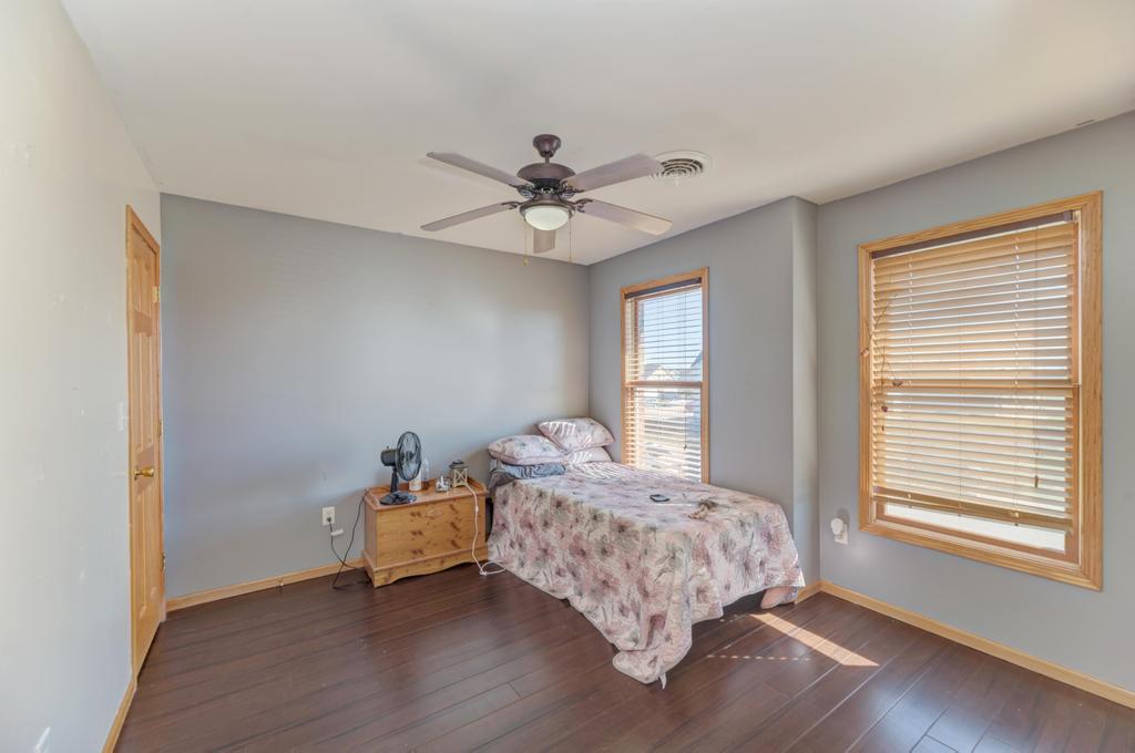 1648 Periwinkle Drive Morris, IL 60450 - Photo 24 of 40 a bedroom with a bed and a window