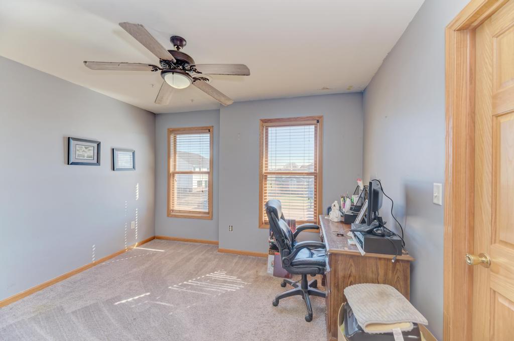 1648 Periwinkle Drive Morris, IL 60450 - Photo 25 of 40 a view of a workspace with furniture and a window