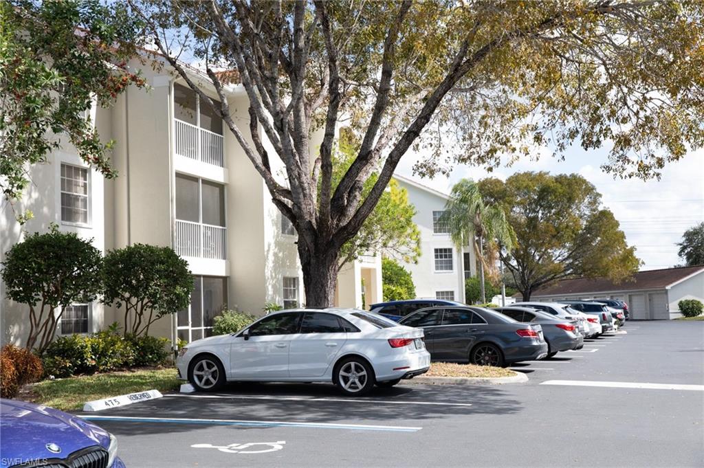 4650 St Croix Lane, Unit 726 Naples, FL 34109 - Photo 7 of 15 View of uncovered parking lot