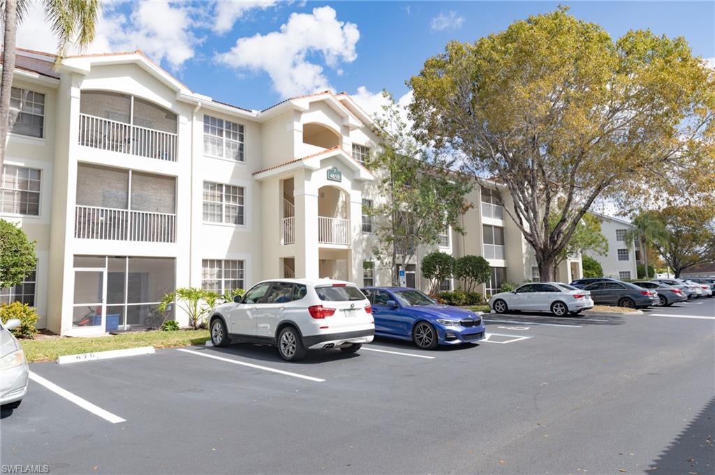 4650 St Croix Lane, Unit 726 Naples, FL 34109 - Photo 8 of 15 View of apartment building / complex with uncovered parking