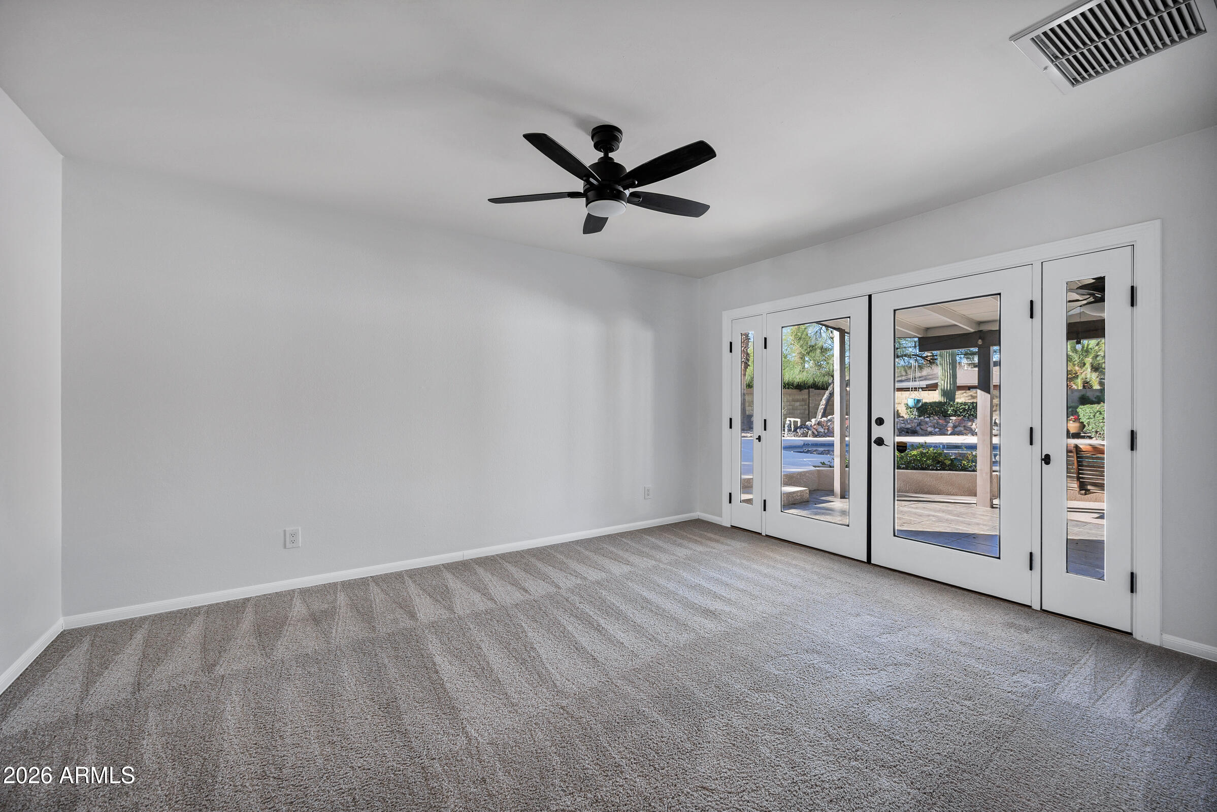 11202 North 42nd Place Phoenix, AZ 85028 - Photo 28 of 55 an empty room with closet and windows