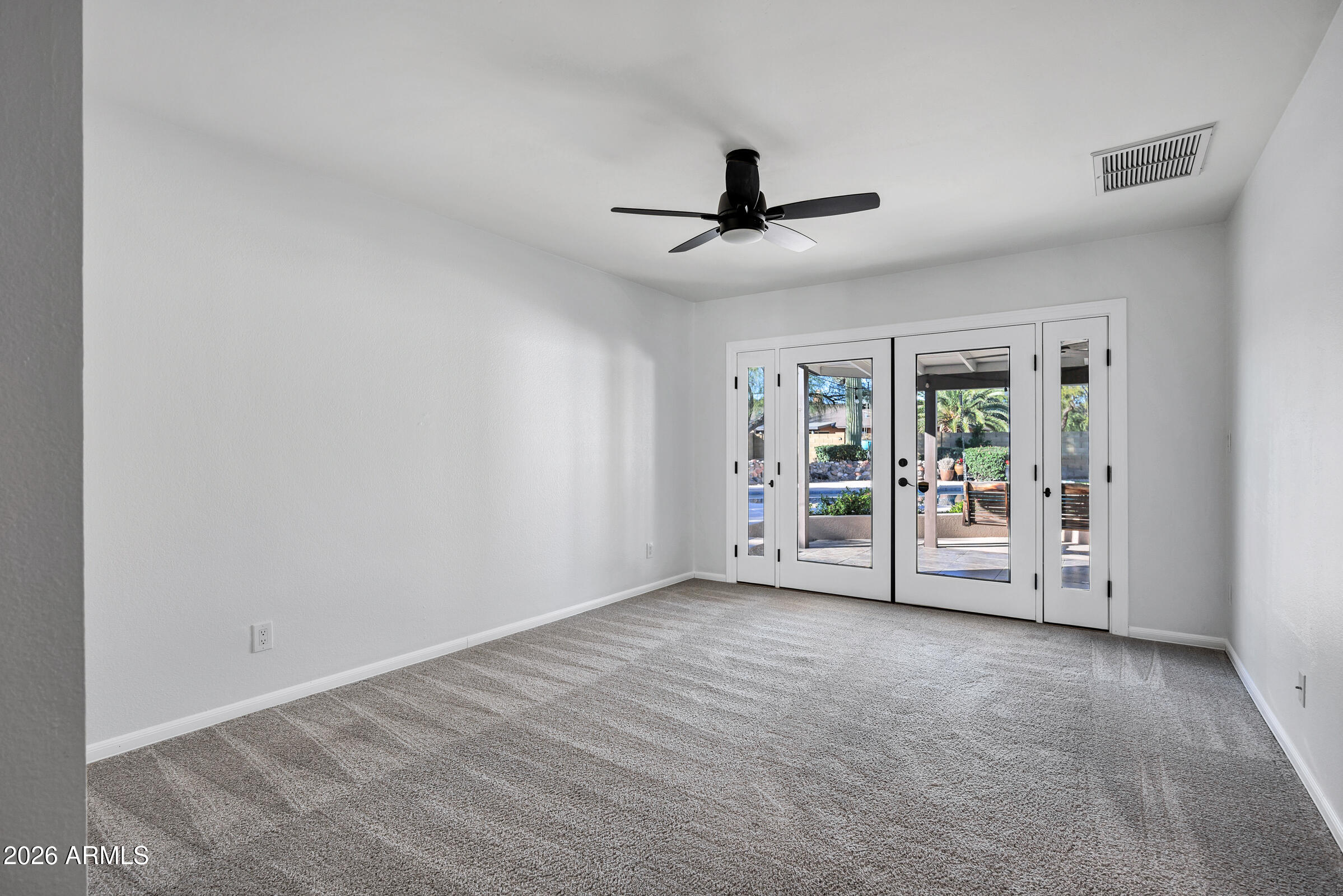 11202 North 42nd Place Phoenix, AZ 85028 - Photo 29 of 55 a view of an empty room with a window