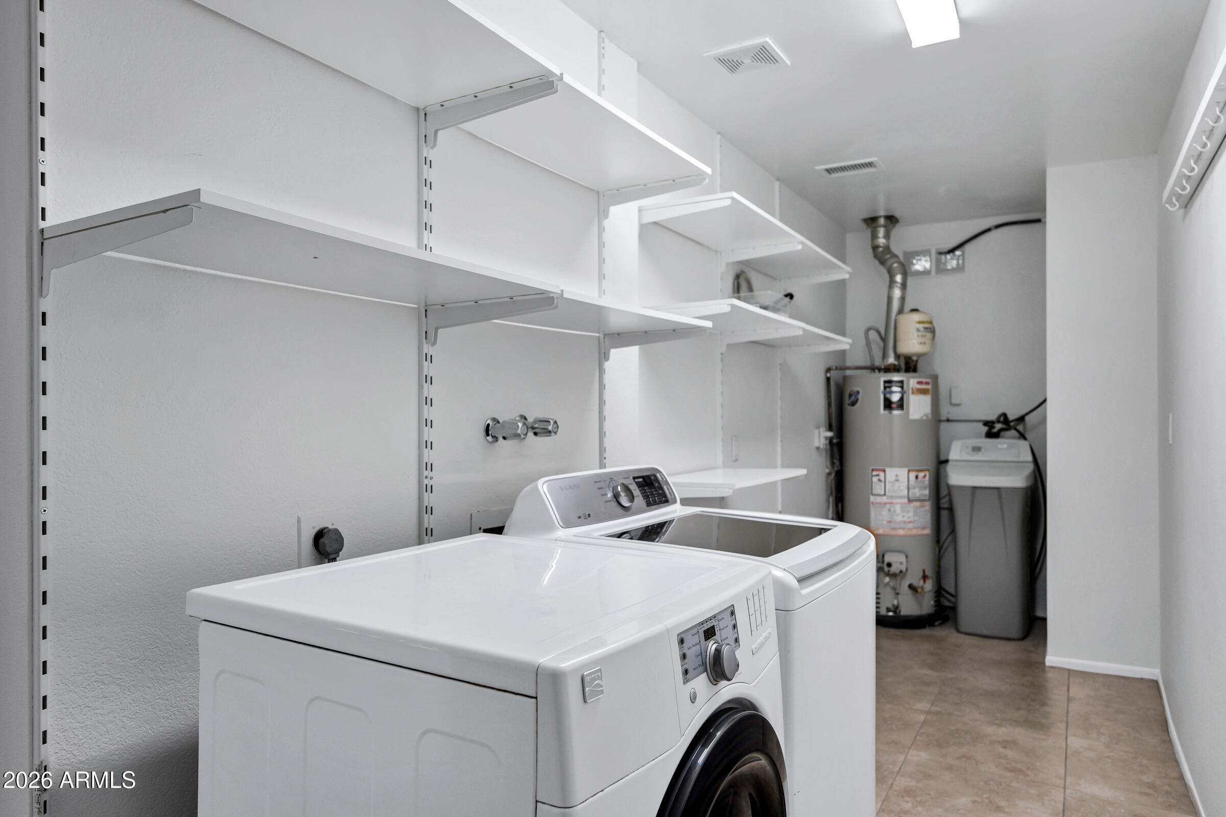 11202 North 42nd Place Phoenix, AZ 85028 - Photo 33 of 55 a utility room with dryer and washer